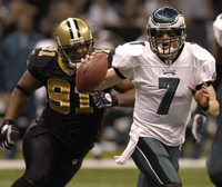 Philadelphia QB Jeff Garcia runs out of the pocket.